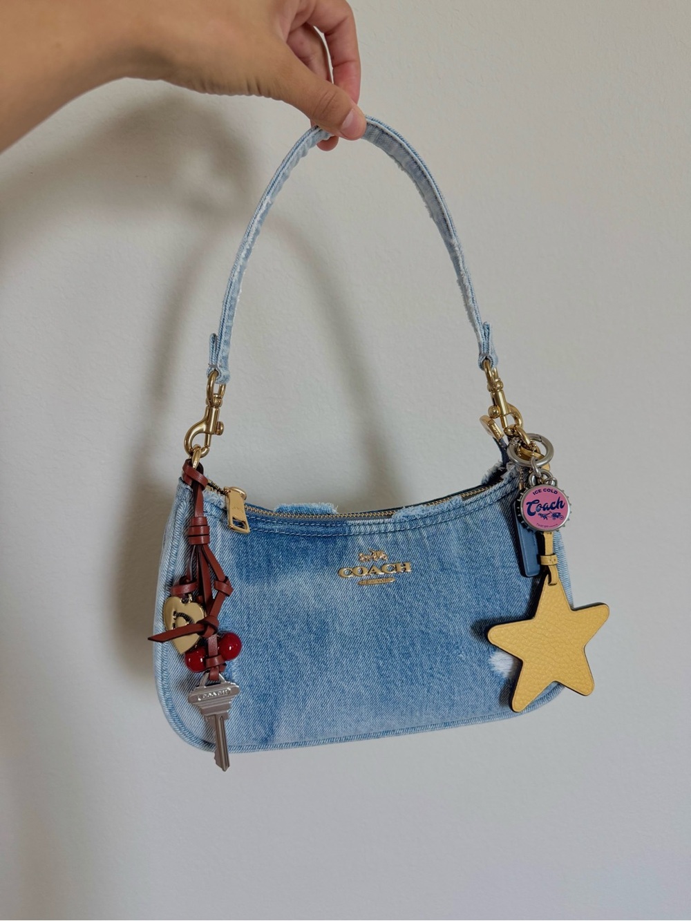 Coach Light Blue Denim Shoulder Bag with Yellow Star Charm and Leather Tassel